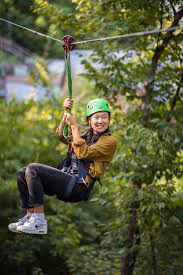Smiling zip line participant in Alabama